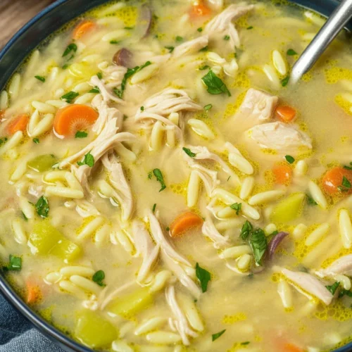 Delicious Greek Lemon Chicken Soup (Avgolemono) in a cozy bowl