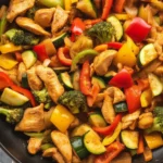 Healthy Chicken and Vegetables Skillet with colorful veggies and juicy chicken pieces.