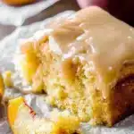 Delicious Brown Sugar Peach Cake topped with fresh peaches and brown sugar glaze.