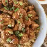 High Protein Crispy Sesame Popcorn Chicken served with sesame seeds and garnished for flavor.