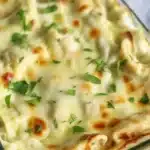 High Protein Chicken Alfredo Lasagna with creamy sauce and chicken, perfect for meal prep.