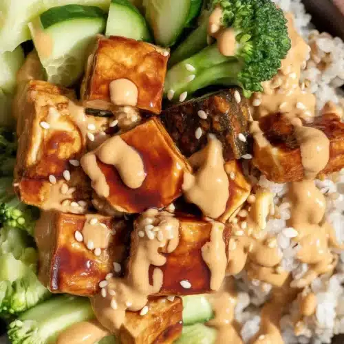 High Protein Low Calorie Crispy Bang Bang Salmon Bites served with sauce