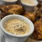 Bowl of homemade Dolly Parton’s Stampede Soup garnished with herbs