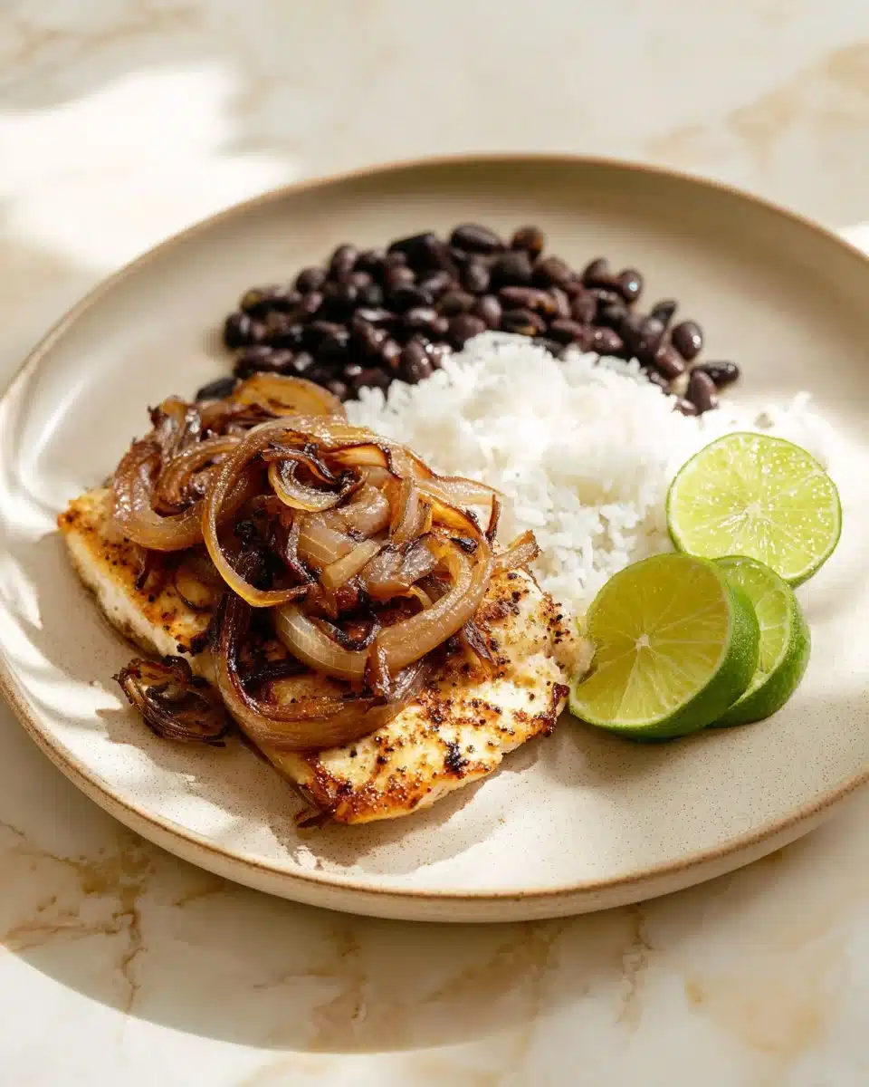 Cuban Griddled Chicken Breast served with a side of vegetables.