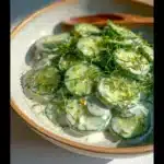Delicious Polish cucumber salad with fresh herbs and spices