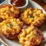 Back-to-school mac and cheese bites served in a colorful lunchbox