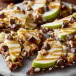 Delicious homemade Caramel Apple Bark with chocolate and apple pieces