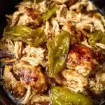 Plate of flavorful Mississippi Chicken served with sides