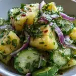 Pineapple Cucumber Salad with fresh pineapple and cucumber slices in a bowl