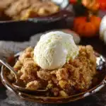 Delicious Pumpkin Crisp dessert topped with crunchy oats and spices