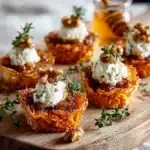 Savory pumpkin goat cheese bites served on a platter.