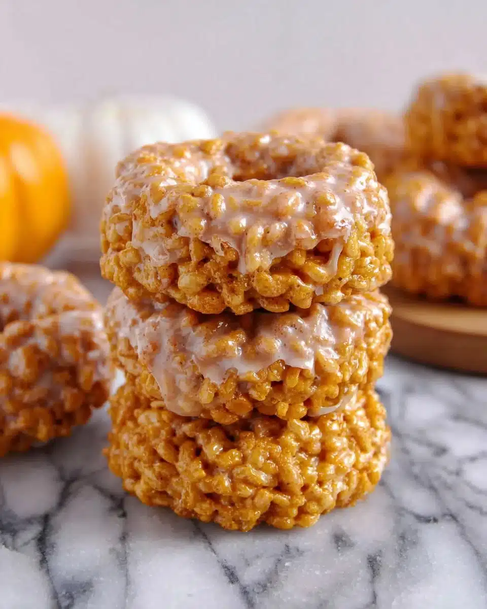 Pumpkin Rice Krispie Donuts topped with fall spices