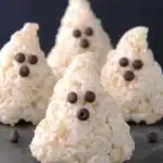 Spooky Rice Krispie Treats shaped like ghosts for Halloween