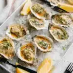 Delicious baked oysters topped with breadcrumbs and herbs