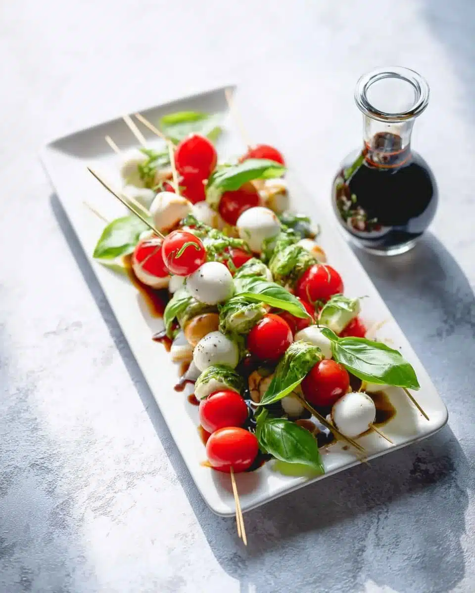 Delicious Caprese Skewers with mozzarella, tomatoes, and basil on display.