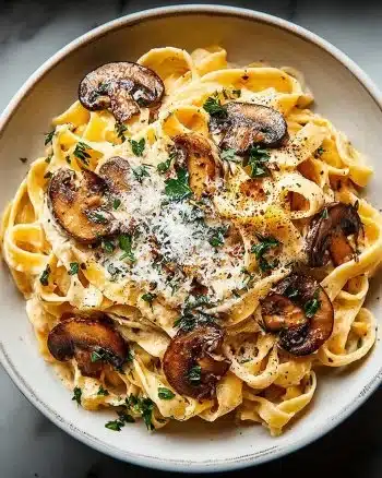 Creamy mushroom and truffle pasta served in a bowl