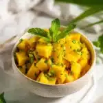 Fresh Mango Mint Salsa served in a bowl with vibrant colors and ingredients.