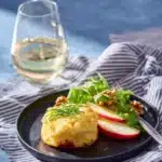 Twice Baked Cheese Souffle served on a plate with garnish