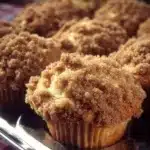 Freshly baked apple muffins topped with cinnamon and sugar
