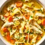 Homemade chicken noodle soup with tender chicken and fresh vegetables.