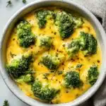Delicious crockpot broccoli cheese casserole served in a bowl