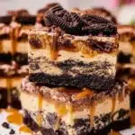 Dessert bar recipe featuring layers of sweet ingredients and toppings.