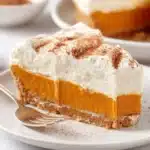 Delicious no-bake pumpkin pie topped with whipped cream
