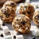 Delicious S'mores Energy Bites with chocolate, marshmallows, and graham crackers.