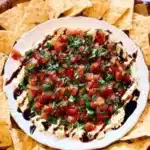 Delicious bruschetta dip served with crispy bread