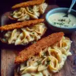 Creamy Chicken Alfredo Pasta Boats served with a sprinkle of parsley