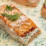 Creamy Dill Salmon dish garnished with fresh herbs