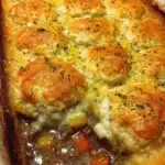 Easy ground beef pot pie casserole with Cheddar Bay biscuit topping