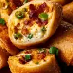 Crispy bacon jalapeño popper eggrolls on a plate