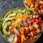 Healthy Buffalo Chicken Bowl with spicy chicken and fresh vegetables