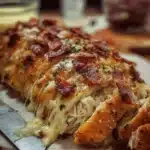 Cheesy Chicken and Turkey Bacon Stromboli fresh out of the oven, delicious and crispy.