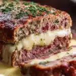 Delicious Chicken Cordon Bleu Meatloaf Recipe with ham and cheese filling.