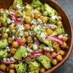 Chickpea feta avocado salad with vibrant vegetables and dressing