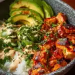 Coconut Chicken Rice Bowl with fresh herbs and vibrant vegetables