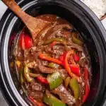 Crockpot pepper steak dish with vegetables in sauce