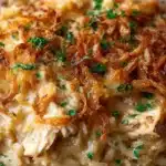 French Onion Chicken Orzo Casserole with melted cheese and herbs