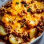 Hobo Casserole with ground beef, vegetables, and cheese baked until golden.
