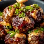 Plate of Korean BBQ meatballs served with spicy mayo dip