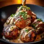 Plate of Korean BBQ meatballs served with spicy mayo dip on the side.