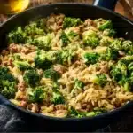 Delicious One-Pot Ground Turkey Orzo served in a bowl with herbs.