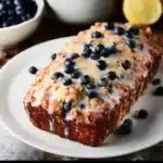 Sourdough Blueberry Lemon Quick Bread with golden crust and fresh blueberries