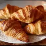 Freshly baked sourdough croissants made with sourdough starter.