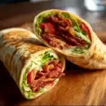 Delicious BLT sandwich with crispy bacon, lettuce, and tomatoes on toasted bread