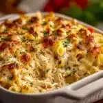 Creamy Banana Pepper Chicken Alfredo Bake with chicken and peppers in a casserole dish