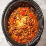 Bowl of delicious Crockpot Root Beer Chili served with toppings