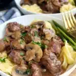 Bowl of easy crockpot beef Burgundy with tender beef and vegetables